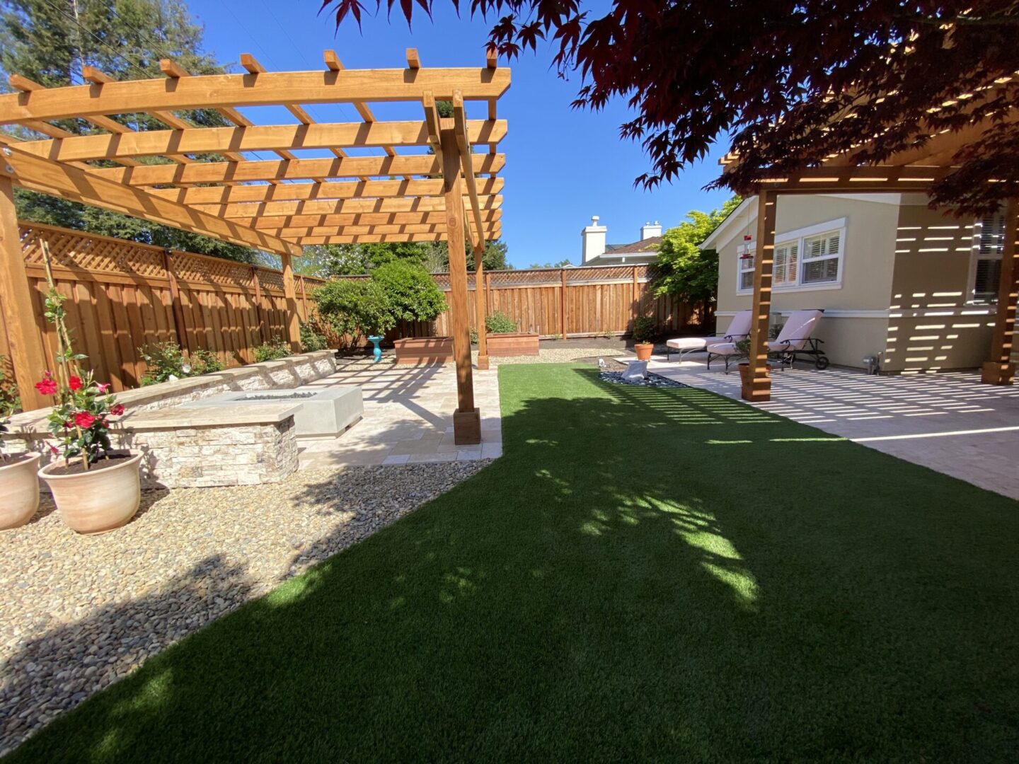 Artificial lawn in backyard, landscaping service by Guys Yard Design in Sonoma, CA