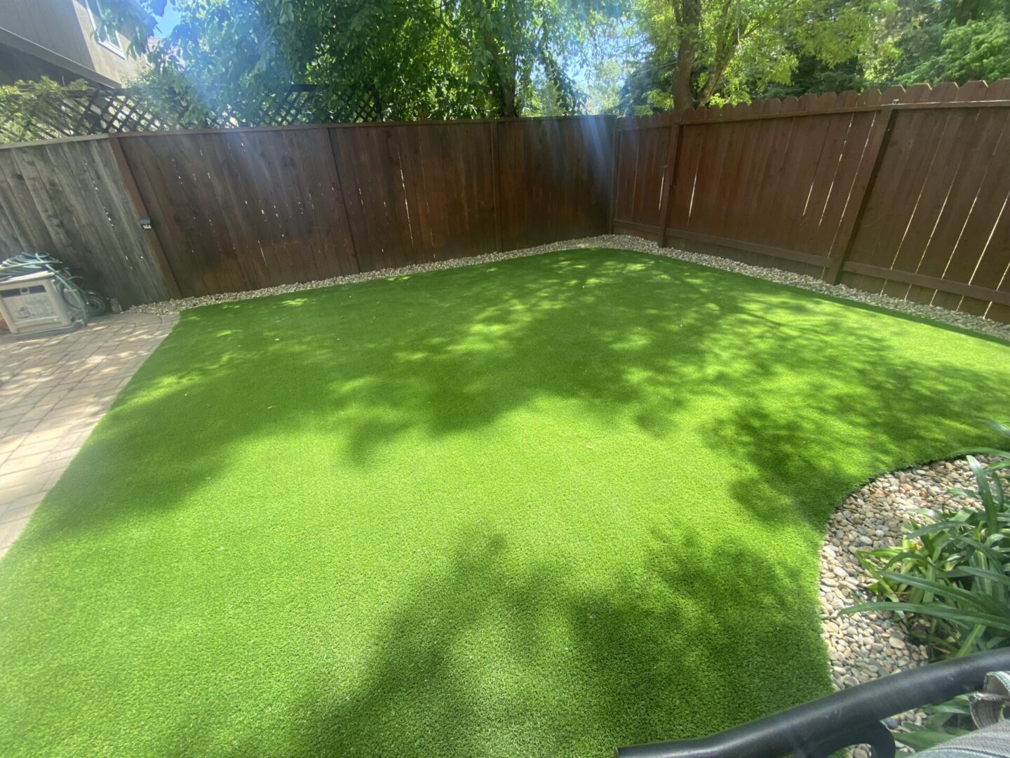 Artificial grass, tiles, pebbles, vegetation, landscaping by Guys Yard Design in Sonoma, CA