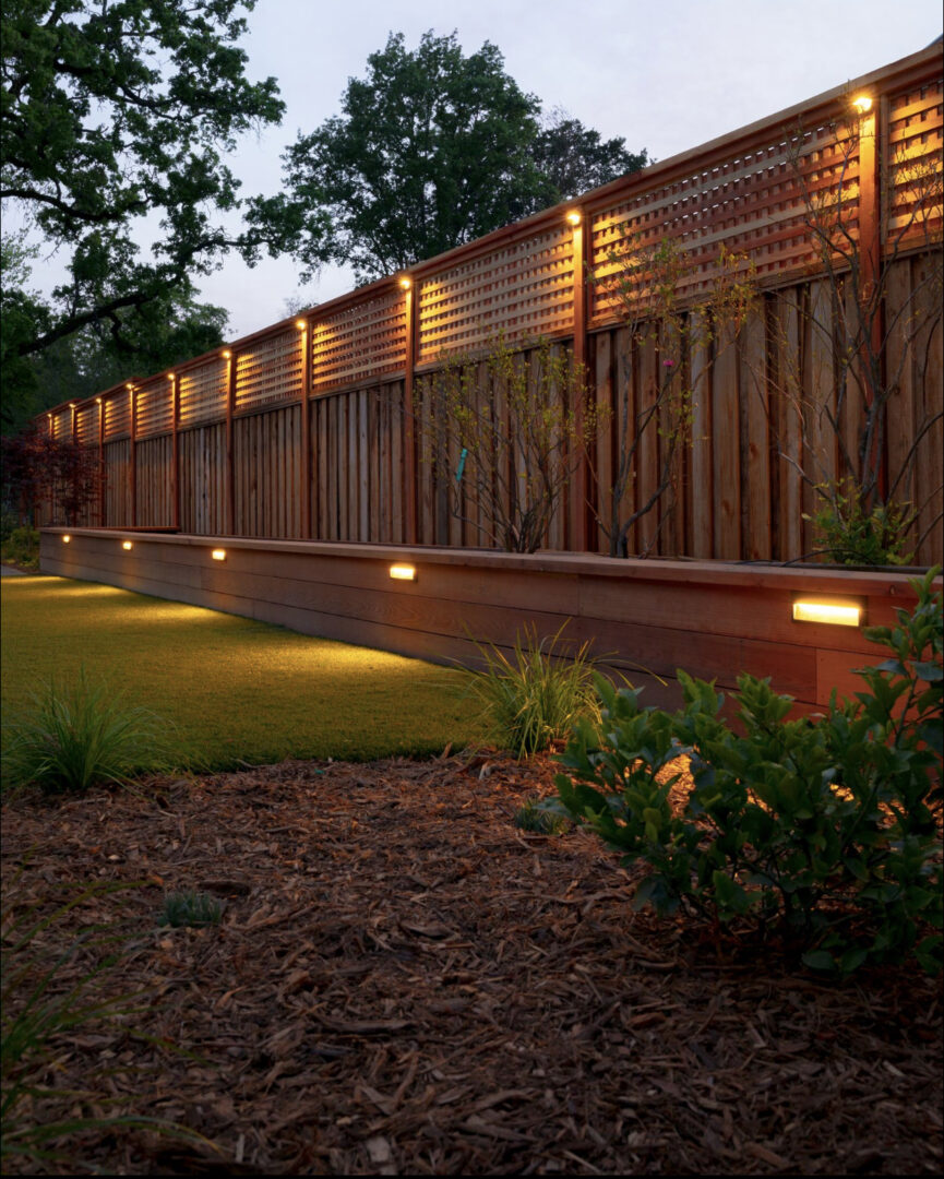 Artificial grass, path lights, fences, landscaping by Guys Yard Design in Sonoma, CA