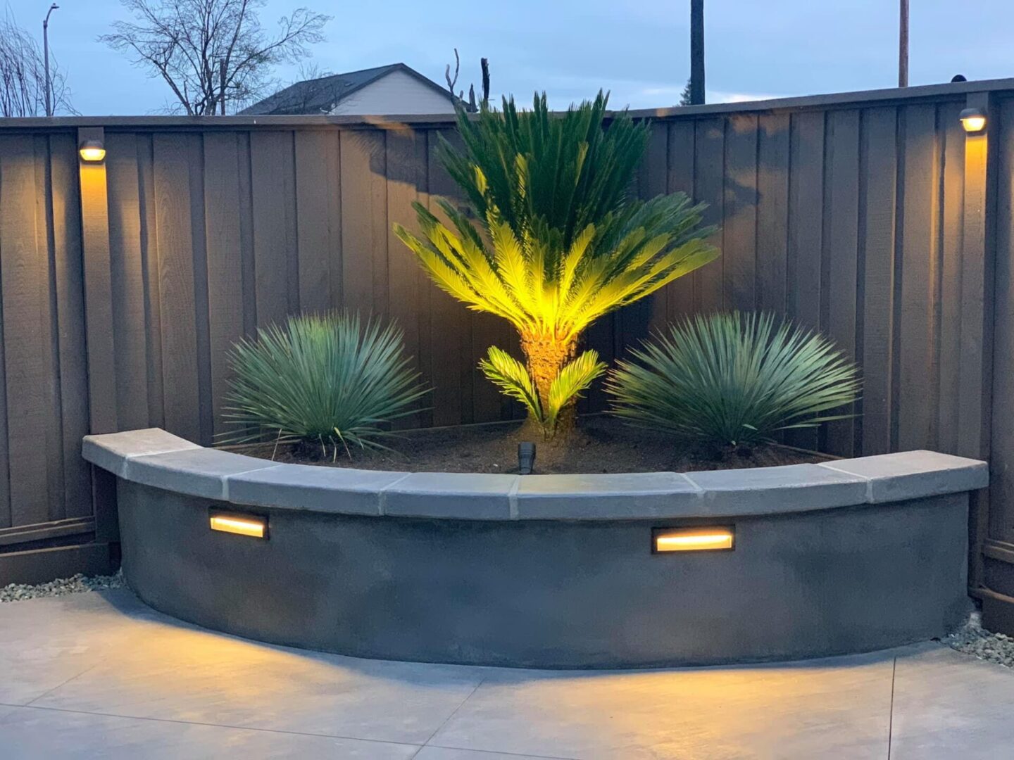 landscape lighting project with plants and path lights by Guys Yard Design in Sonoma, CA
